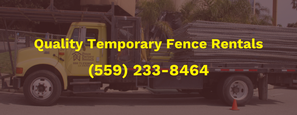 Fence Factory Rentals truck delivering temporary fence panels near Chinatown, Fresno, California.